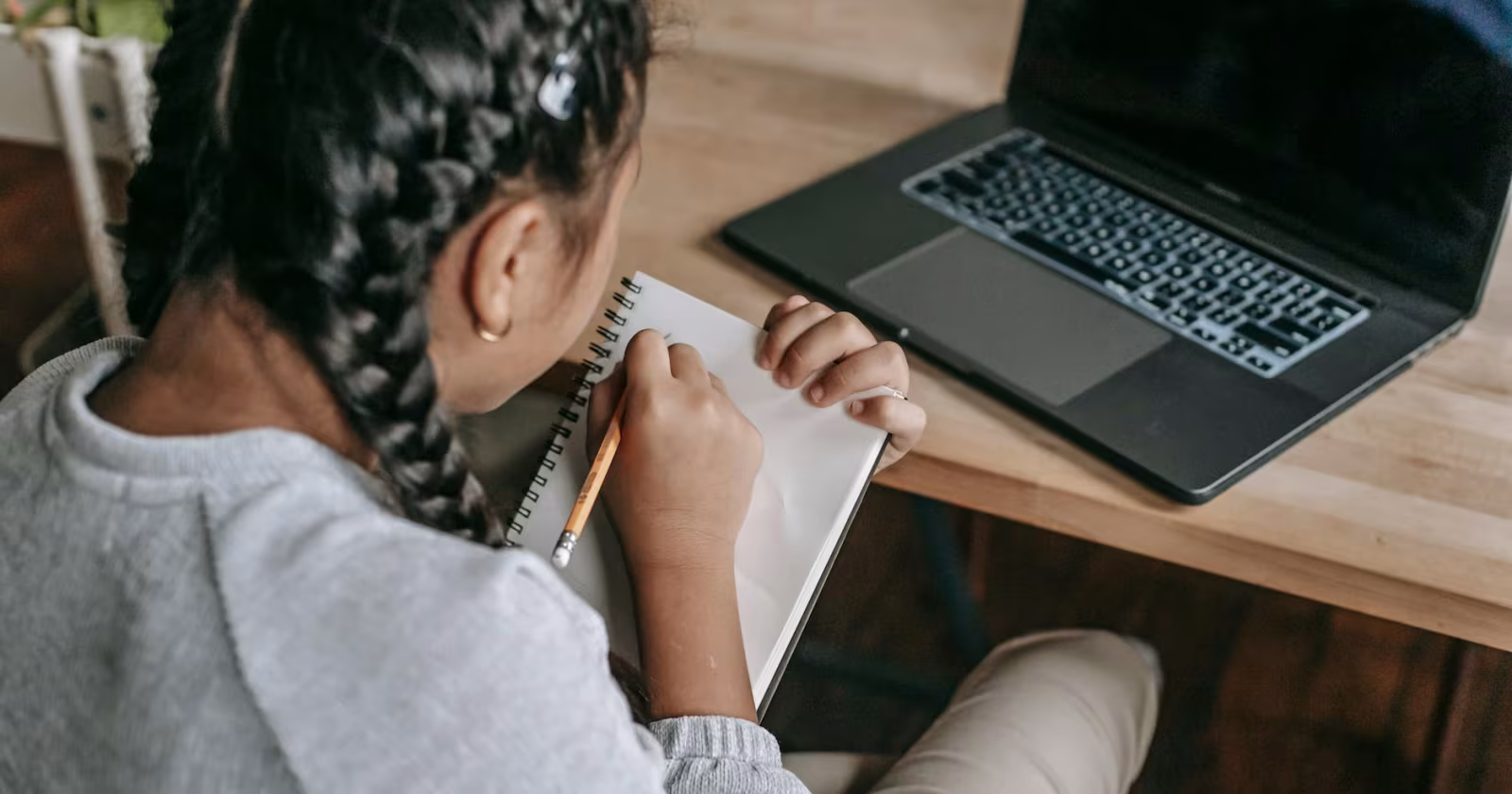 Indian student drawing mind map notes