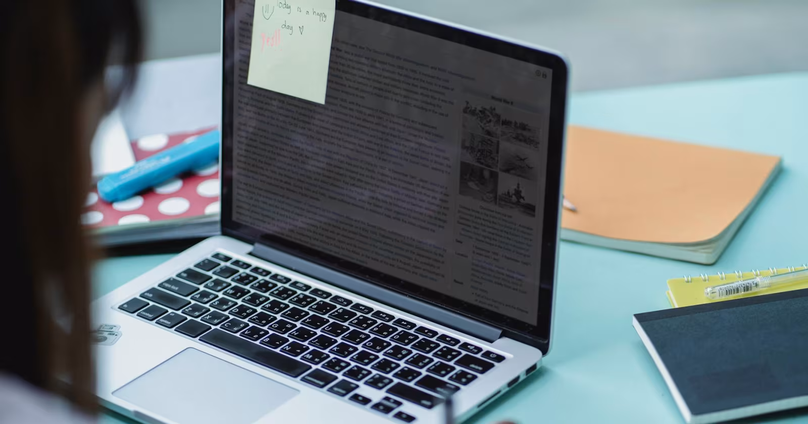 Indian student reading history textbook